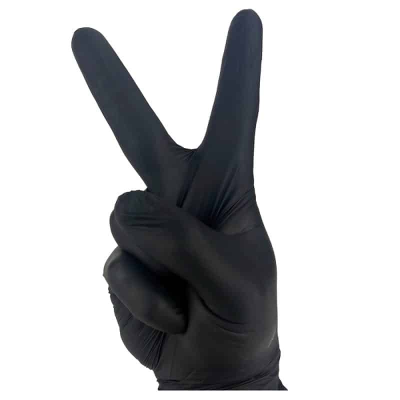 A peace sign made by a hand in a black glove
