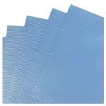 Detailed view of fanned out blue cellulose wipe sheets with a textured pattern