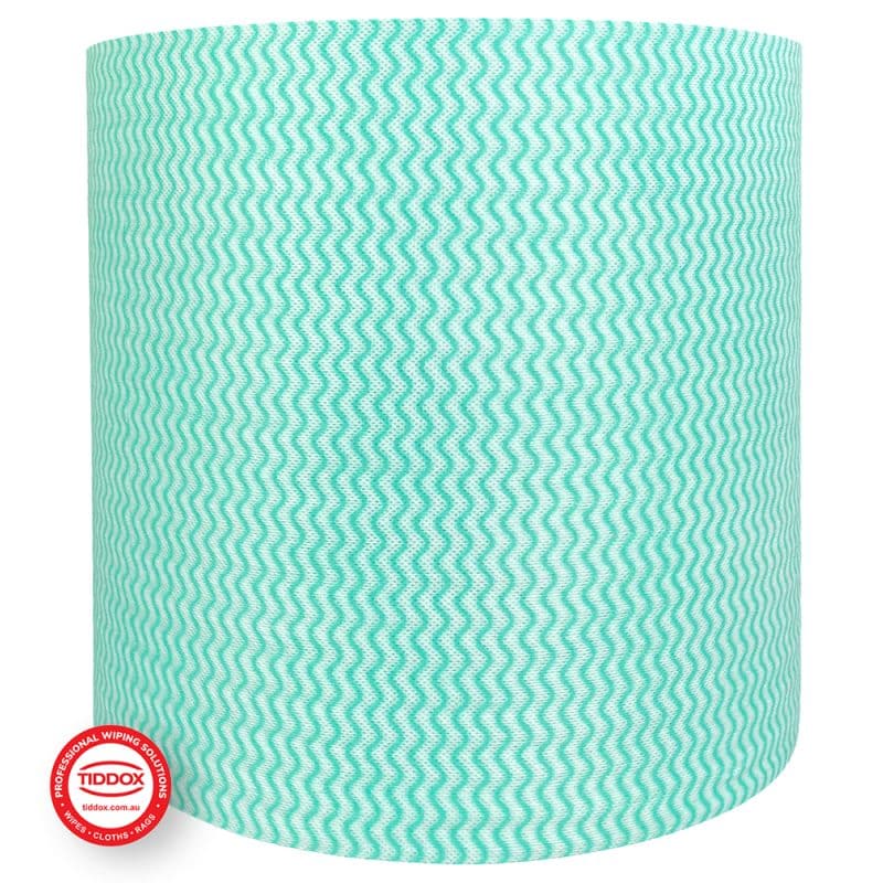Side view of a Jumbo green roll on a plain backdrop