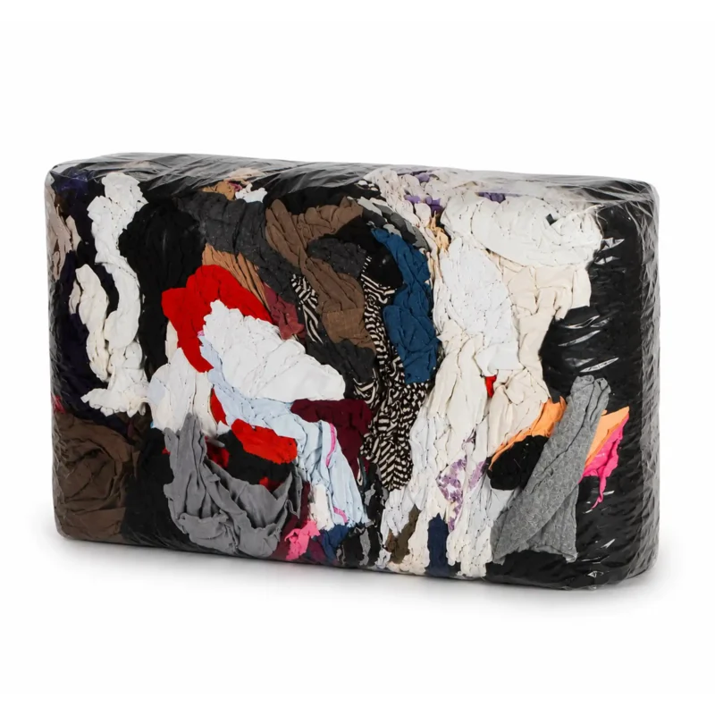 Bundle of coloured t-shirt rags on a white background