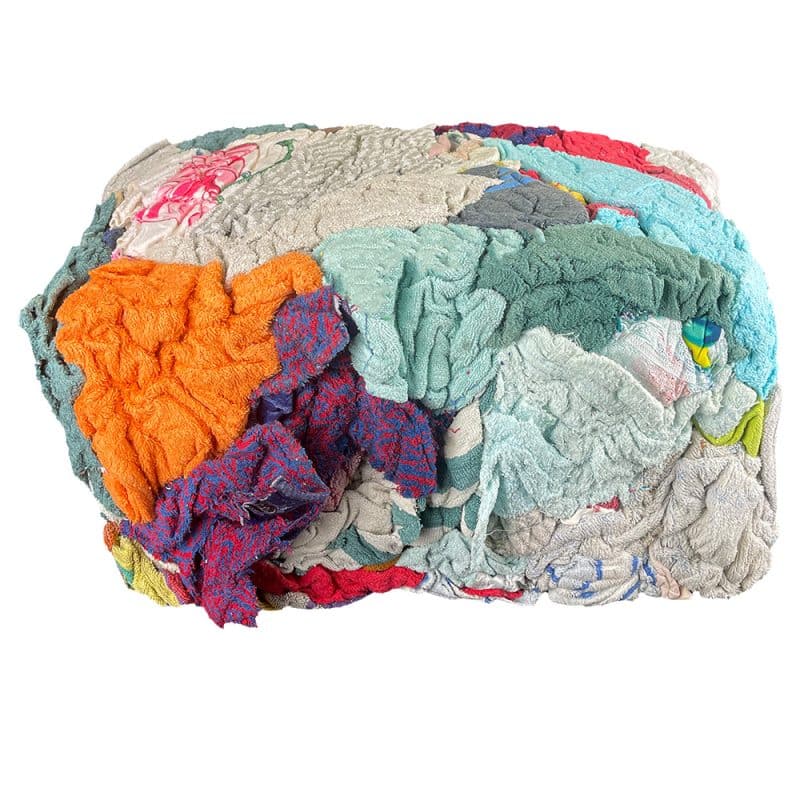 Colourful bundle of towel rags against a white backdrop