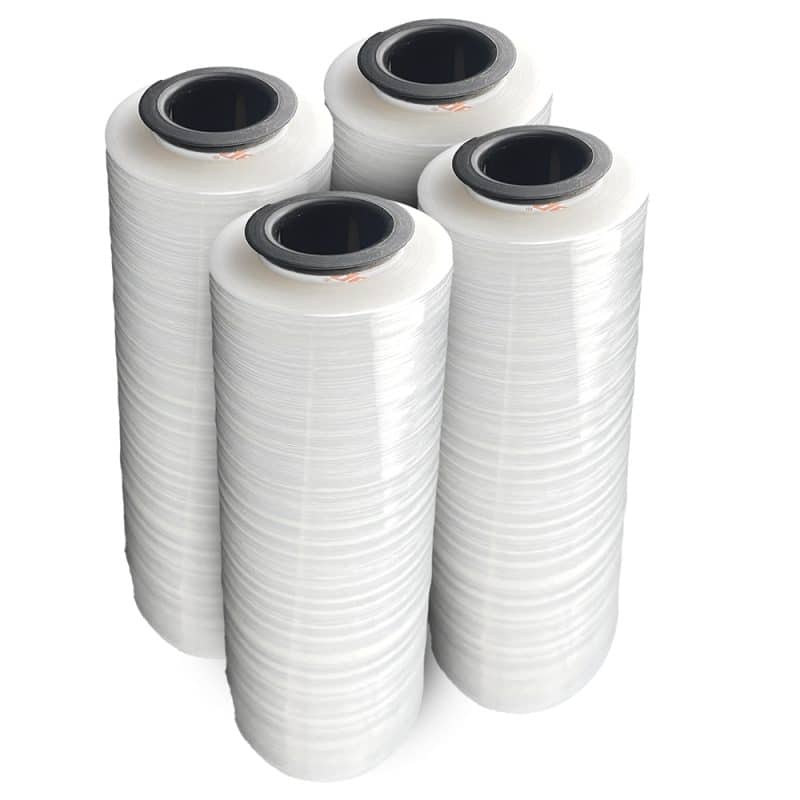Four rolls of clear plastic rolls positioned upright on a white background