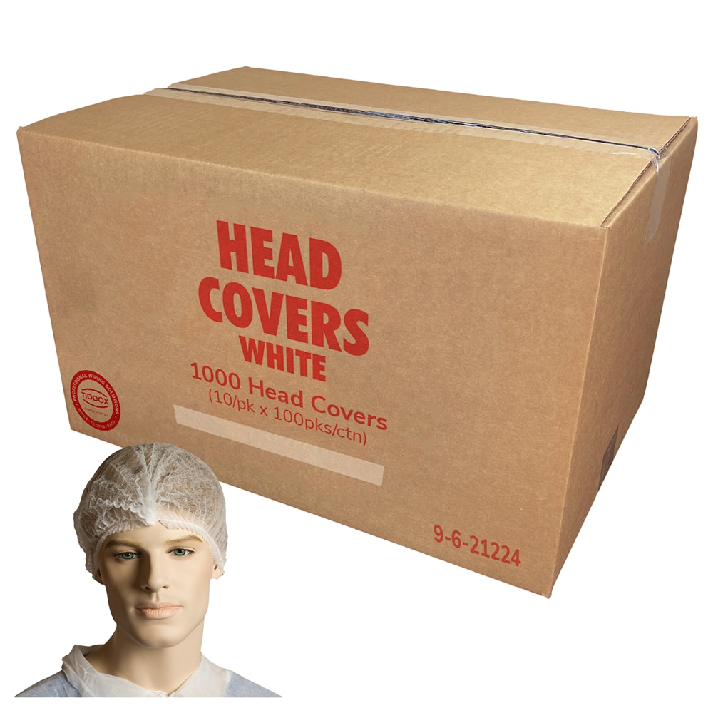A mannequin displaying a white hair cover , with a carton box with red writing