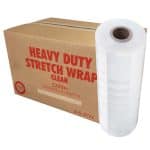 A cardboard box with red writing and a Clear plastic roll on the right