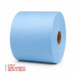 Jumbo paper towel 3Ply Blue roll stacked on its side on a white background.