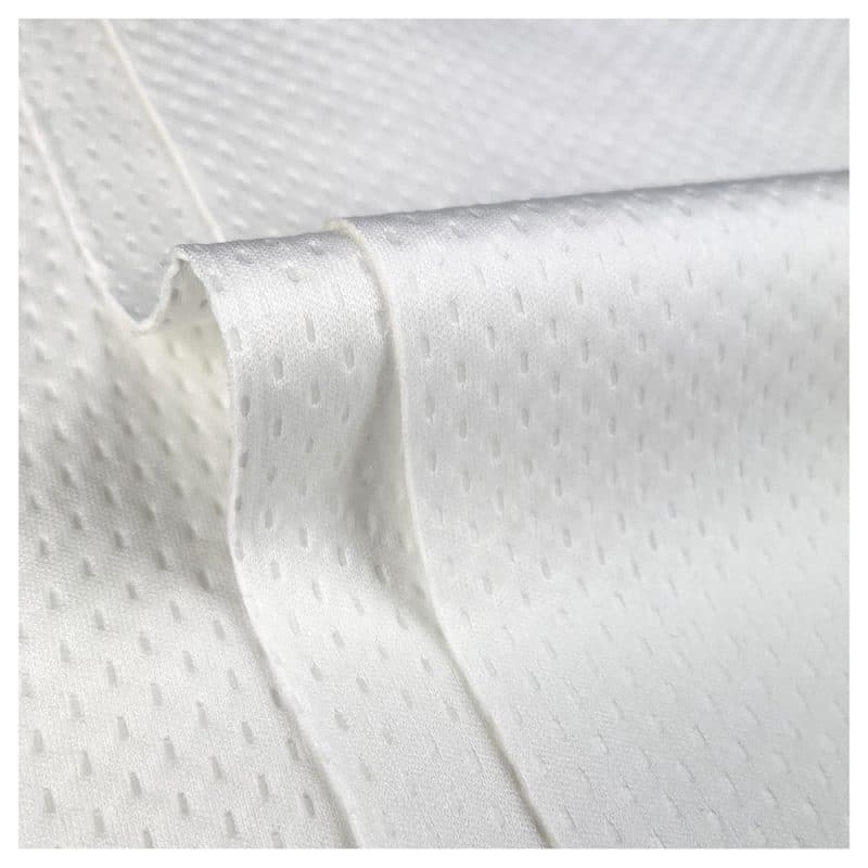 Close up of the quilted texture of a Polysoft wipes with a curve in the middle