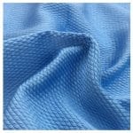 A close-up of a blue microfiber cloth, showing its texture and vibrant color.
