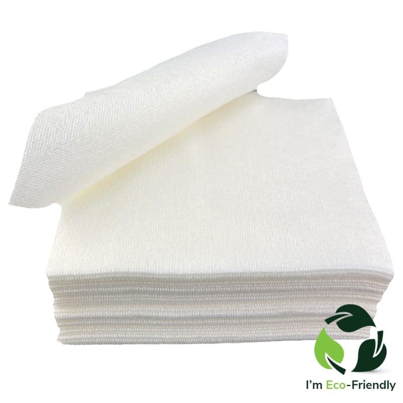 Pile of stacked wipes with the uppermost wipe gracefully curved backward at an angle.