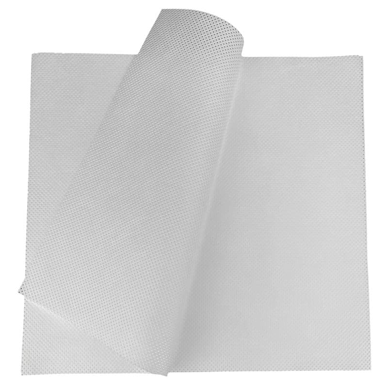 A close up of a white polypropylene wipe folded over with a white background