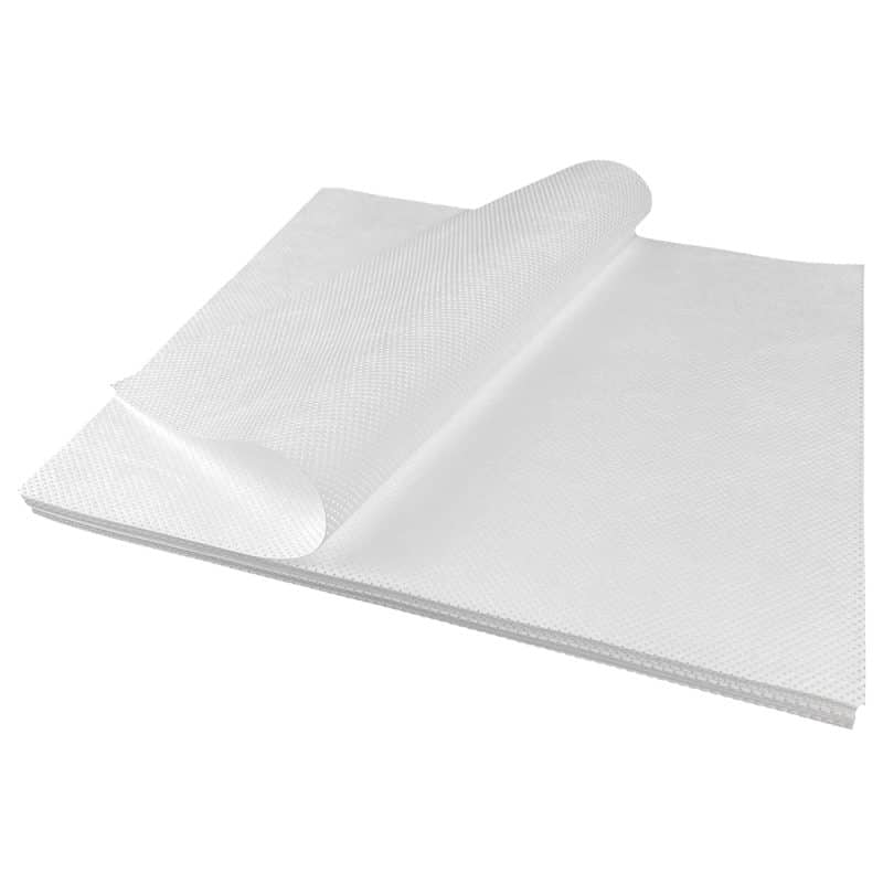 A white polypropylene wipe folded over with a white background