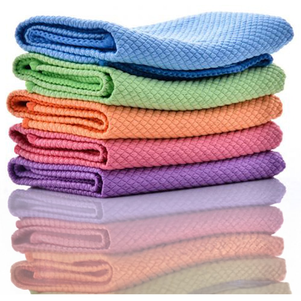 A vibrant stack of cloths, each in a distinct color on a clean white background