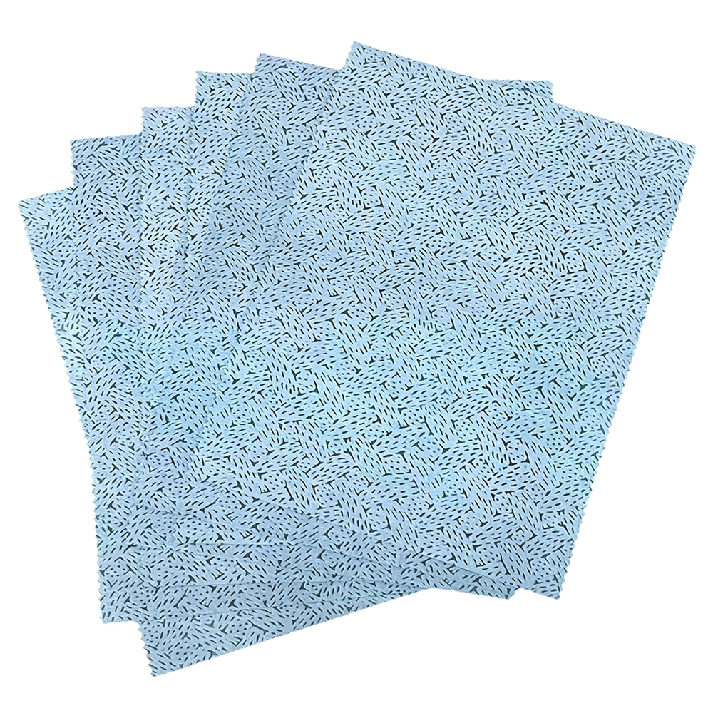 Textured blue wipes with a pattern fanned out on a plain background