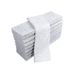 stack of white oil absorbing wipes on a white background