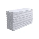 stack of white oil absorbing wipes on a white background