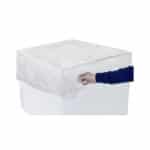 Arm placing a clear cover on top the box on the corner