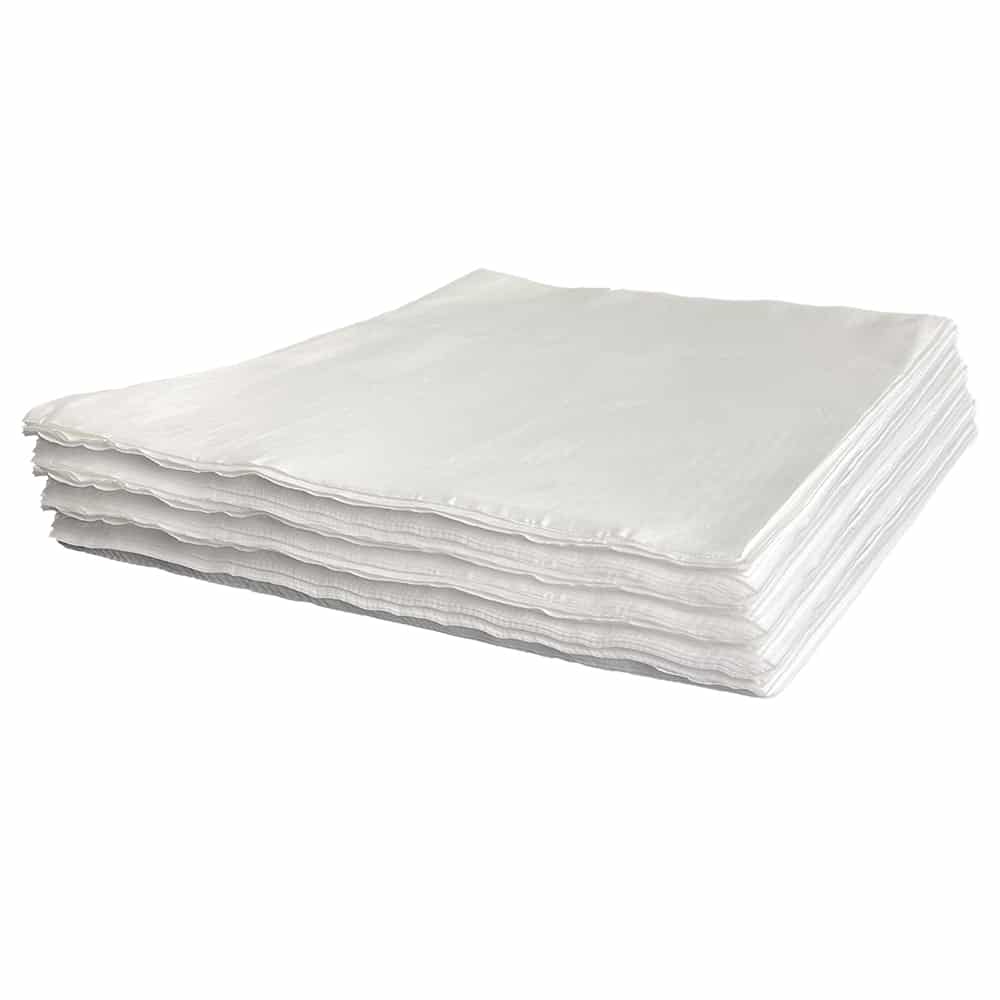 A neat pile of white wipes on a plain white background