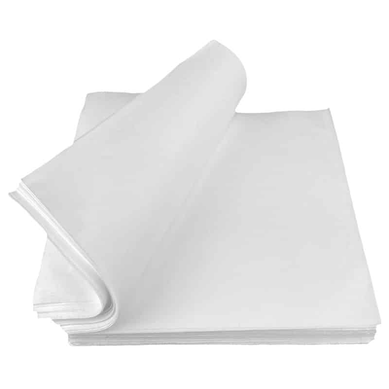 White stack of cellulose wipes with the top layer curved to the left
