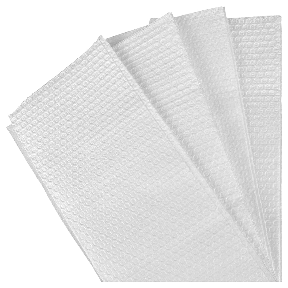 A clean white background showcasing a set of four white towels with a textured pattern, arranged in an orderly manner