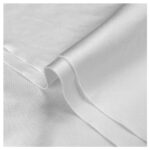 Close-up perspective of a Polysilk No Lint Cloth featuring a folded curve in the middle.