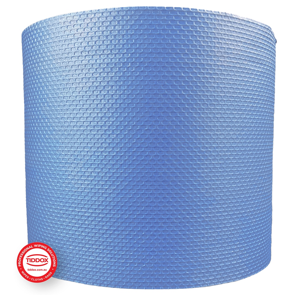 Jumbo blue roll of wipes from the side on a plain background
