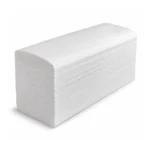 Stack of white multifold hand towels on a white background