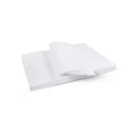 stack of oila and fuel haz pads with a few sheets folded over on a white background