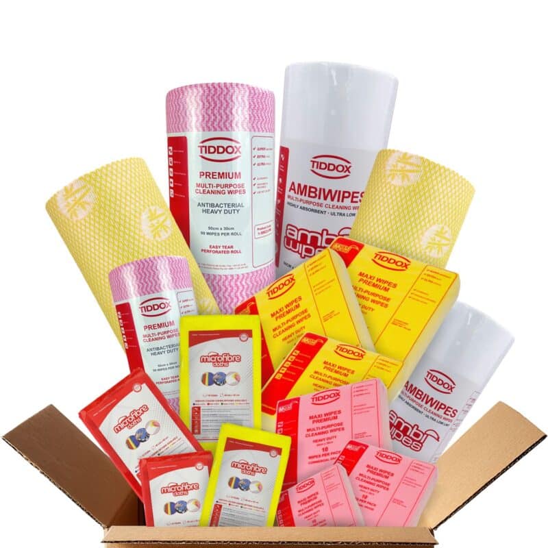a number of wipes and cloths coming out of a cardboard box on a white background